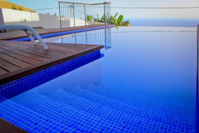 Ferienhaus in Estreito Da Calheta mit Privatem Pool und Meerblick